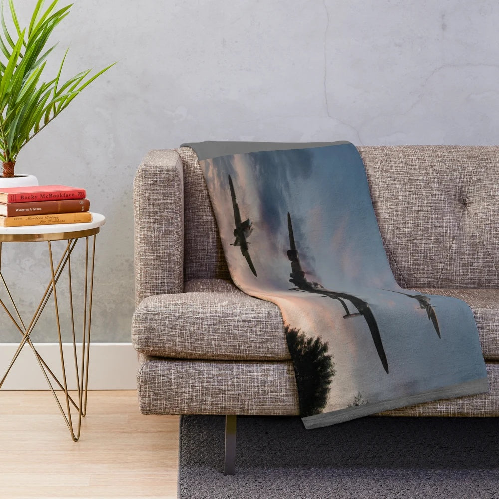Plush blanket depicting a low pass of a Lancaster bomber from the Battle of Britain Memorial Flight at sunset