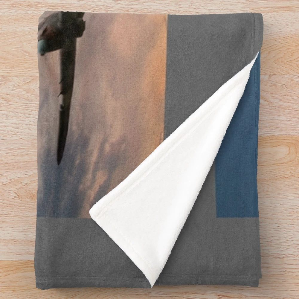 Plush blanket depicting a low pass of a Lancaster bomber from the Battle of Britain Memorial Flight at sunset