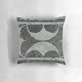 A decorative pillow featuring an intricate mosaic design inspired by ancient Pompeii architecture.
