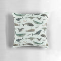 Vibrant tattooed whales printed on a plush throw pillow, perfect for adding a touch of ocean-inspired style to your home.