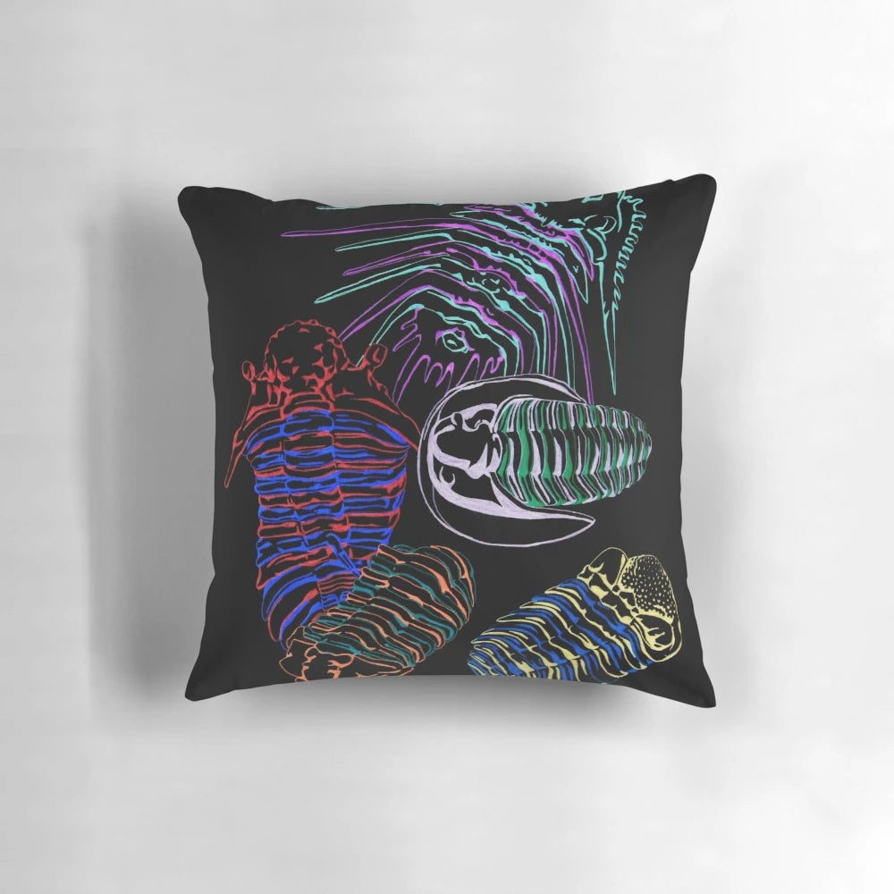 Colorful hand-drawn illustration of trilobite fossils from the Silurian and Devonian eras on a decorative pillow