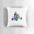 A vibrant, watercolor-style image of a quad bike racing through a rugged, outdoor environment, printed on a soft, comfortable pillow.