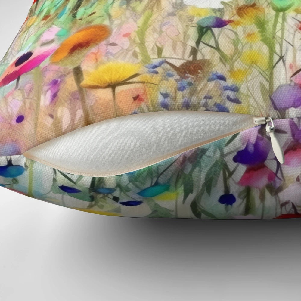 Vibrant watercolor painting of a lush wildflower meadow on a decorative pillow