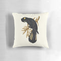 Decorative pillow featuring a photographic image of a yellow-tailed black cockatoo