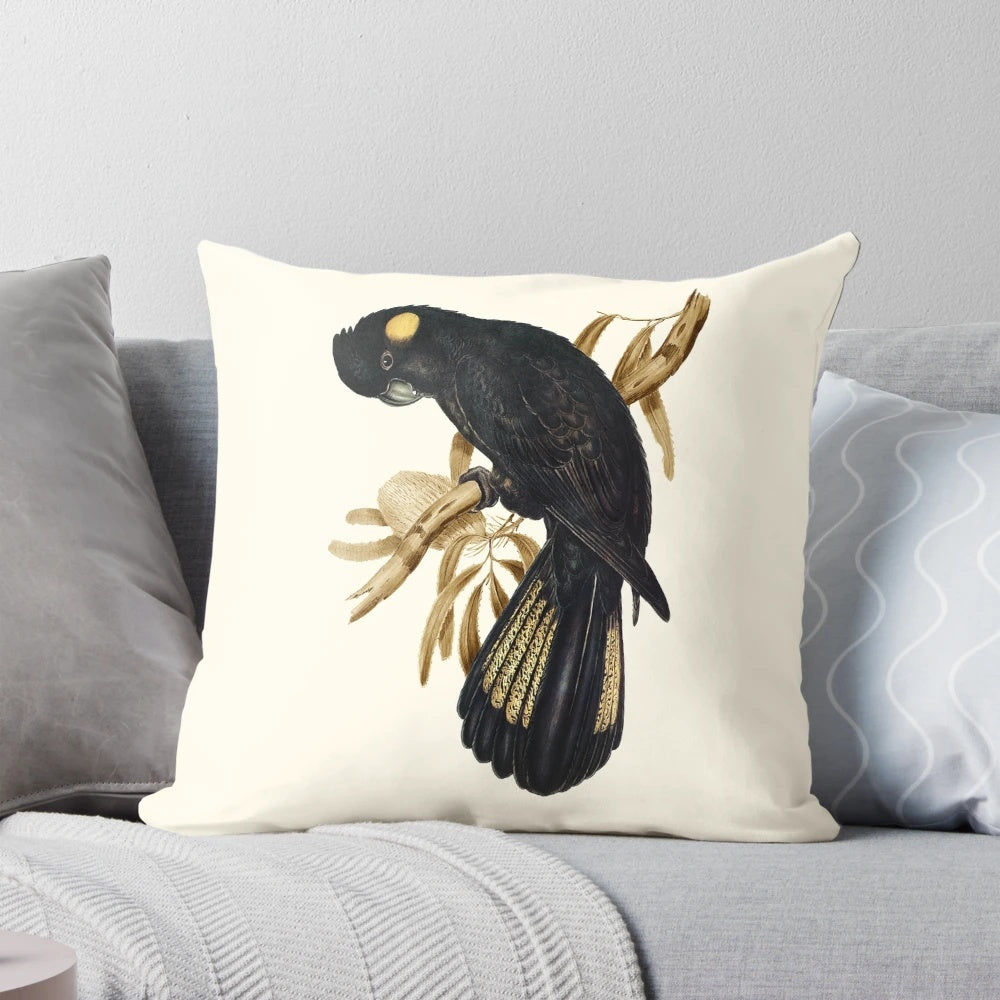 Decorative pillow featuring a photographic image of a yellow-tailed black cockatoo