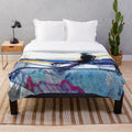 Plush blanket featuring stunt scooter artwork and extreme sports design