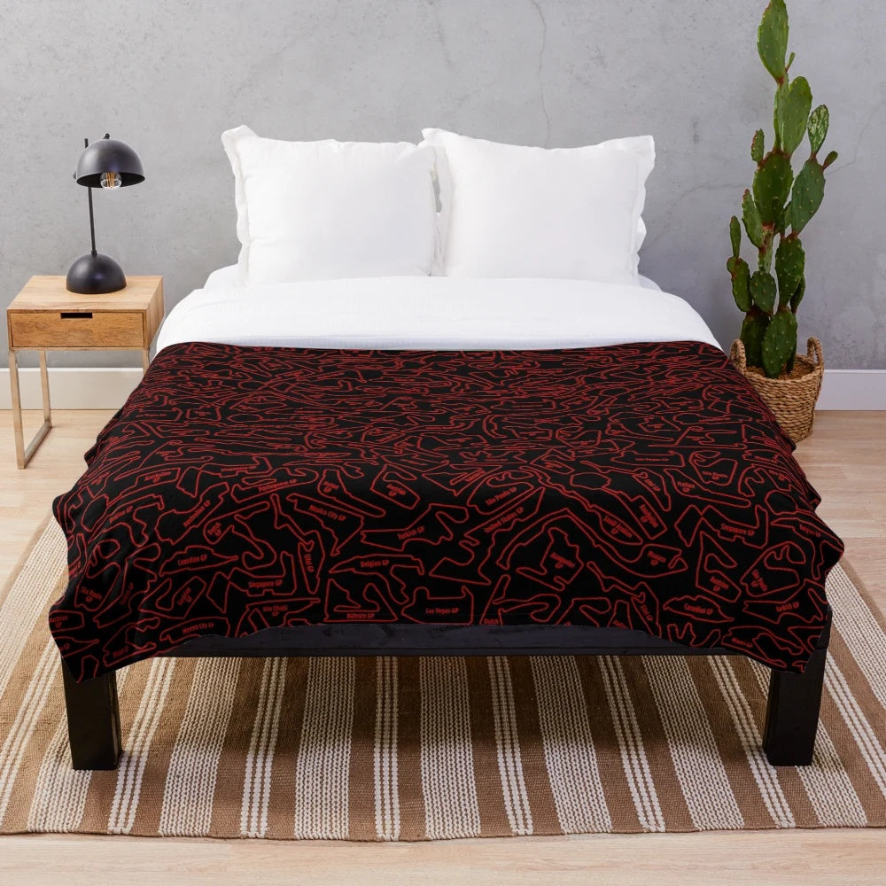 Plush blanket featuring a 2023 race track pattern design