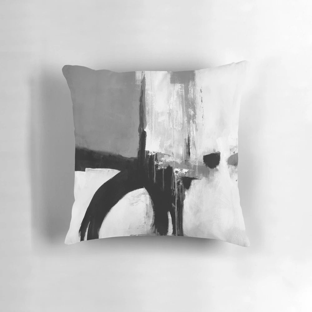 Minimalist abstract black, white, and grey brushstroke pattern pillow