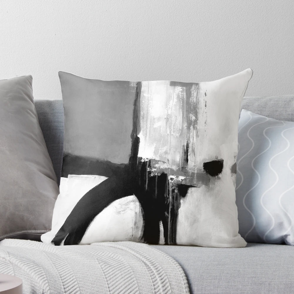 Minimalist abstract black, white, and grey brushstroke pattern pillow