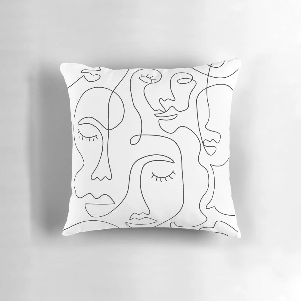 Stylish abstract face line art printed on a soft, high-quality pillow
