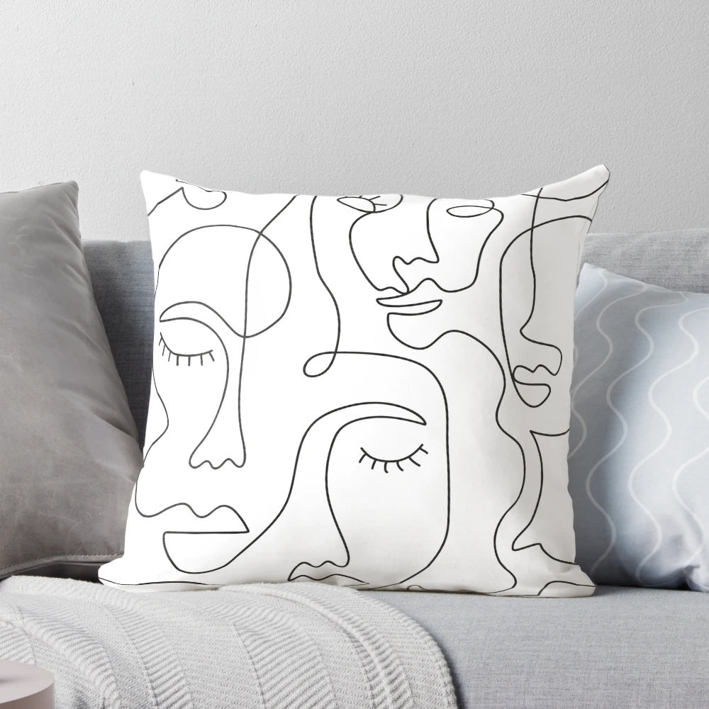 Stylish abstract face line art printed on a soft, high-quality pillow