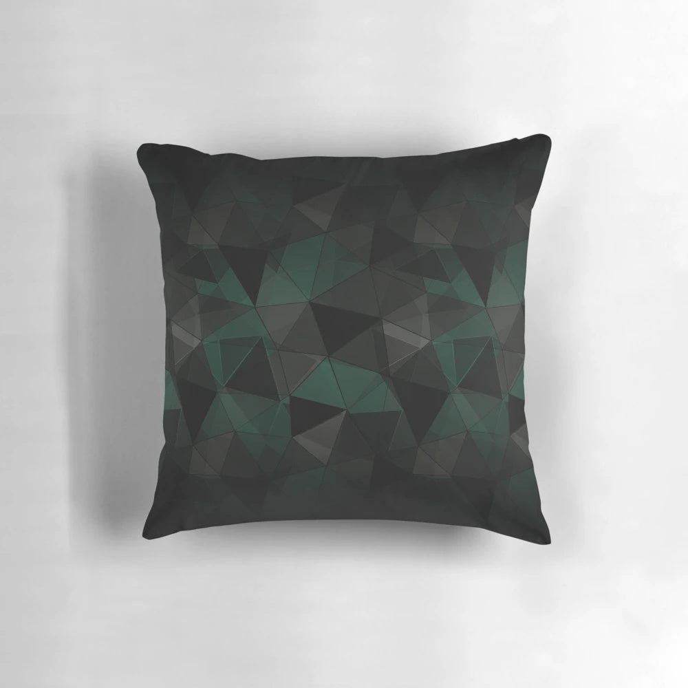 Abstract geometric pattern pillow cover with turquoise, black, and grey triangles