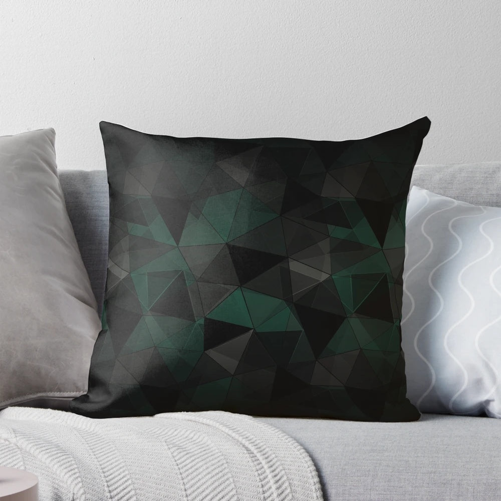 Abstract geometric pattern pillow cover with turquoise, black, and grey triangles