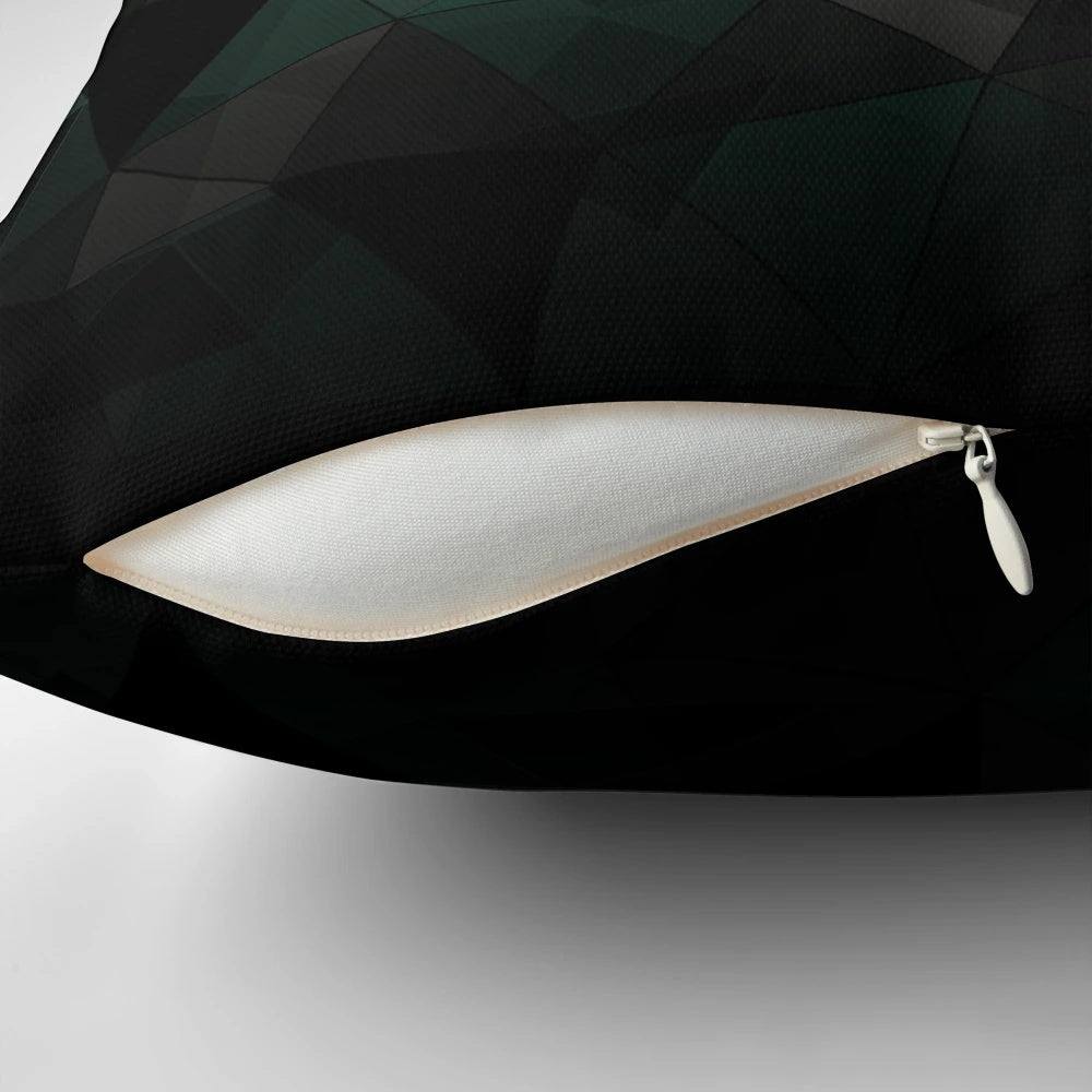 Abstract geometric pattern pillow cover with turquoise, black, and grey triangles