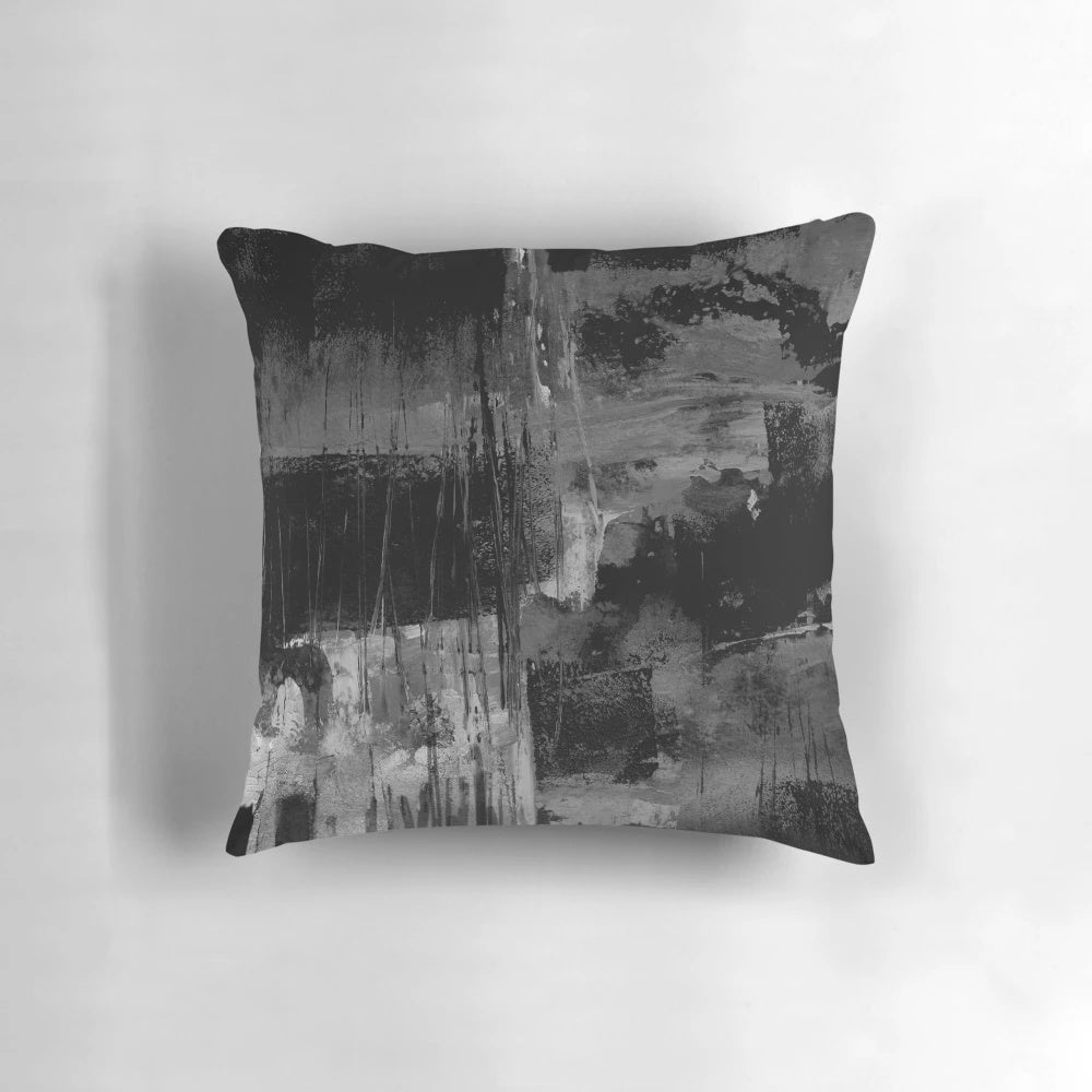 Abstract gray and black pillow with dynamic stripes and gradient design