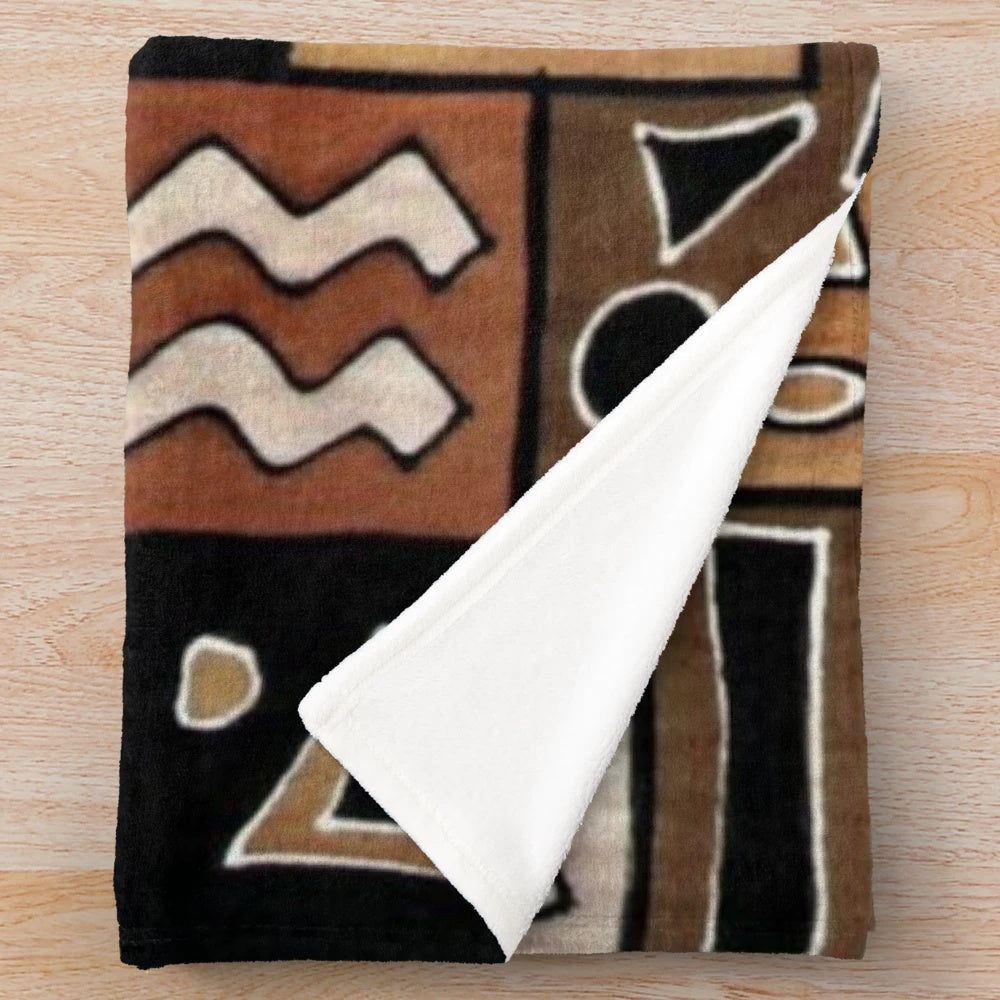 African inspired plush blanket with geometric pattern