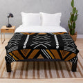 African mud cloth inspired plush blanket with abstract geometric design