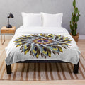 Stylish and cozy designer's plush blanket with vibrant pattern