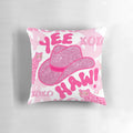 Decorative "Yeehaw!" pillow with a pink cowgirl hat and cheetah print design, perfect for the modern, preppy cowgirl