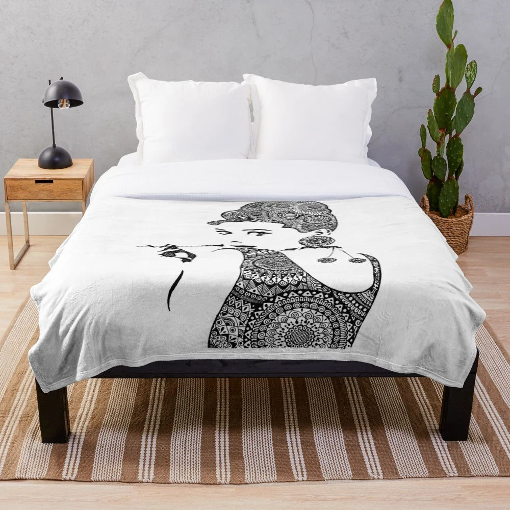 Soft plush blanket featuring a beautiful mandala-style portrait of iconic actress Audrey Hepburn