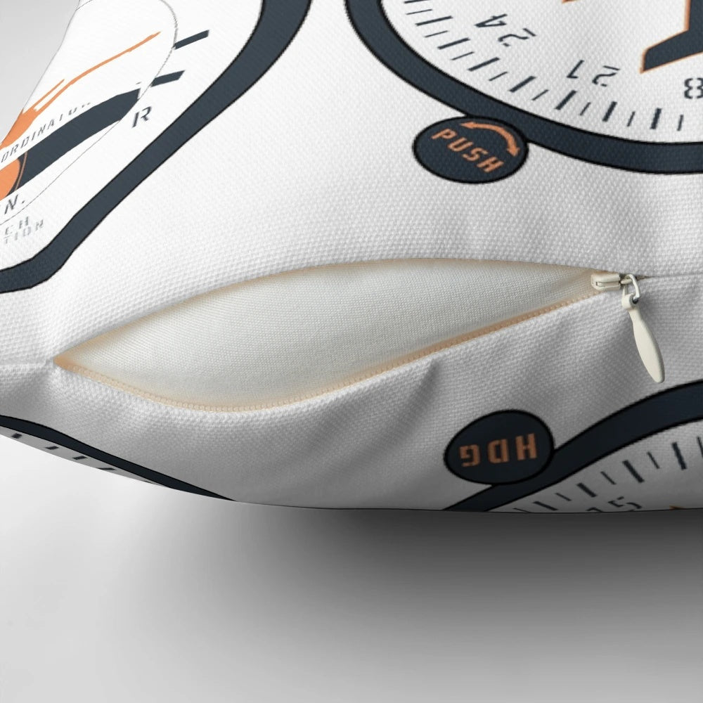 Closeup of a basic six flight instruments pillow, including attitude indicator, altimeter, airspeed indicator, and more.