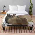 Big Floppa plush blanket featuring a cozy and cute caracal meme design