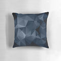 Black and blue polygonal pattern design on a decorative pillow