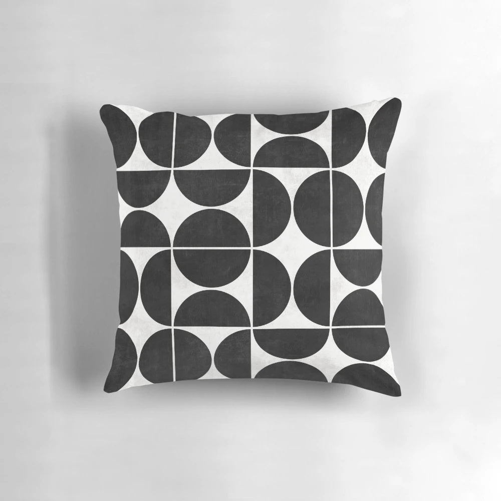 Black and white concrete pillow with a unique geometric circle pattern