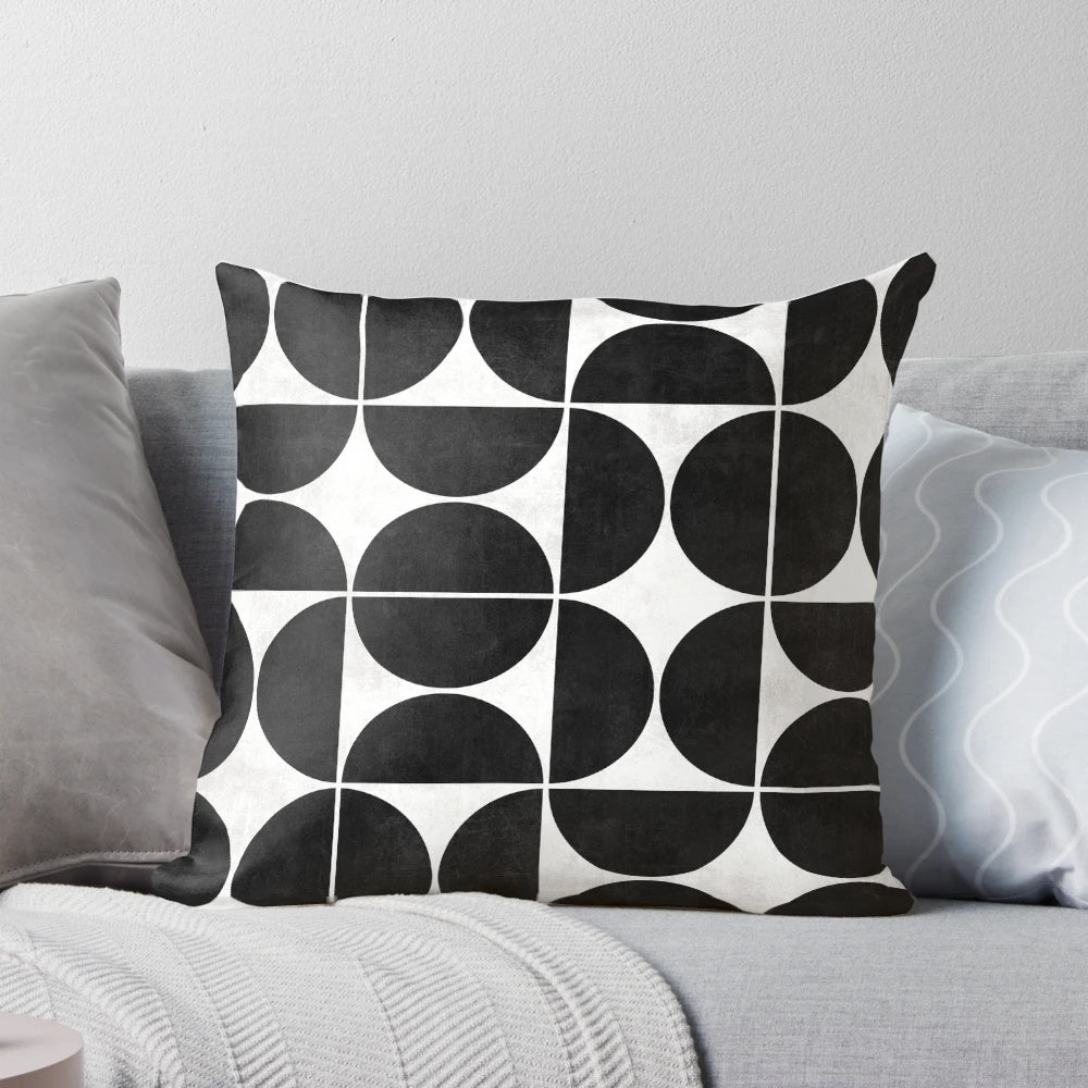 Black and white concrete pillow with a unique geometric circle pattern