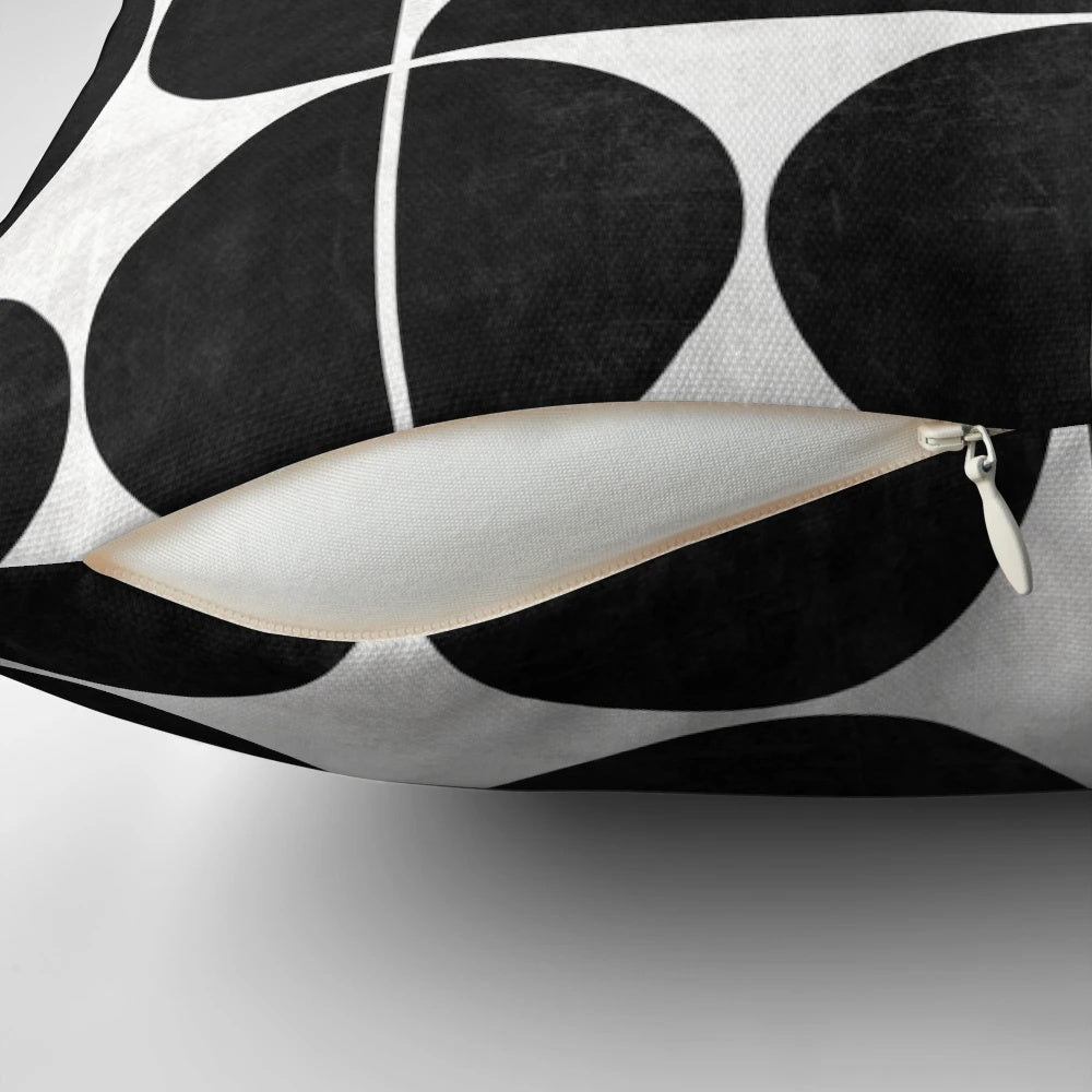 Black and white concrete pillow with a unique geometric circle pattern