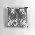 Black and white cowhide patterned accent pillow