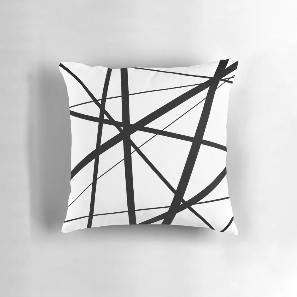 Black and white geometric lines accent pillow with a minimalist, Scandinavian-inspired design