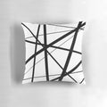 Black and white geometric lines accent pillow with a minimalist, Scandinavian-inspired design