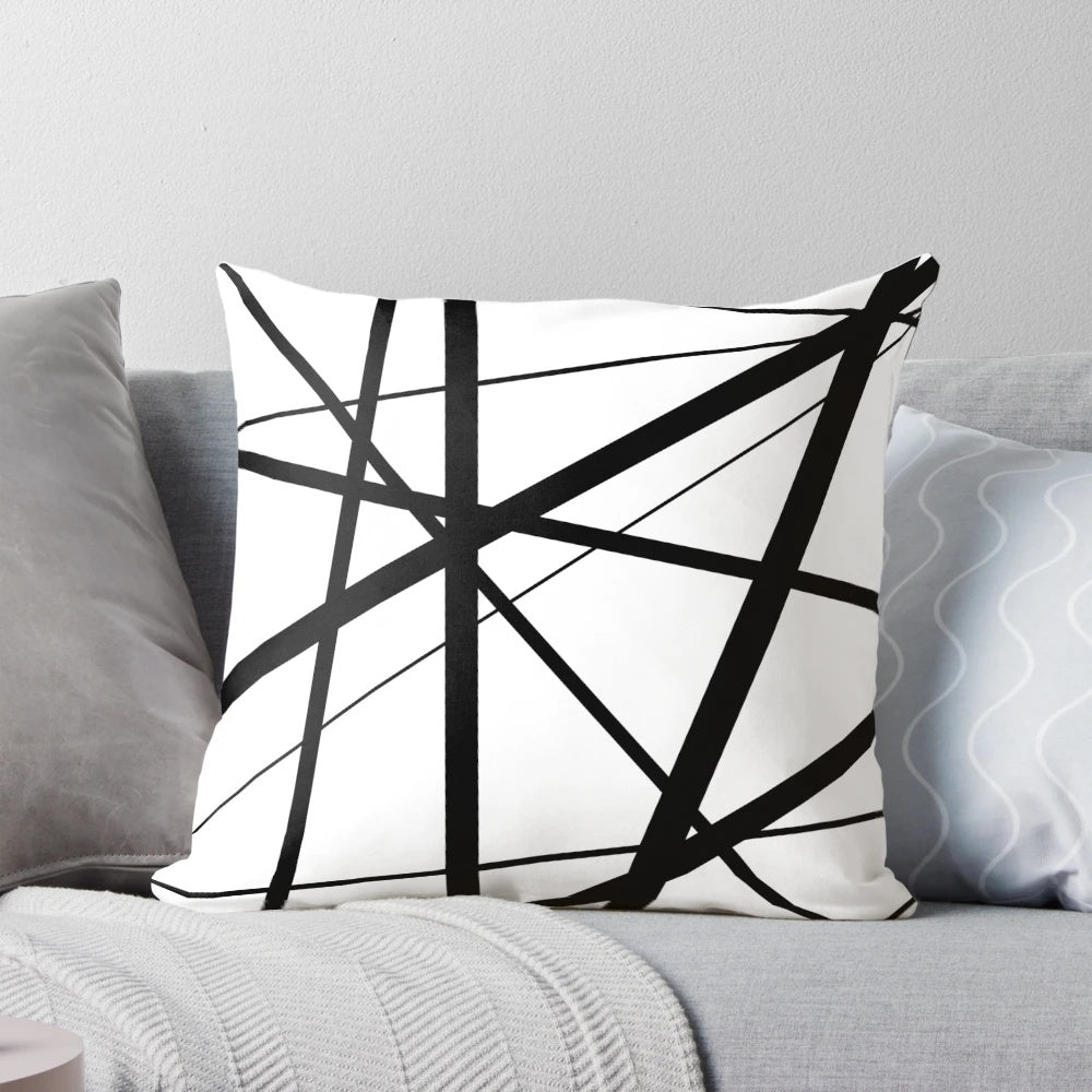 Black and white geometric lines accent pillow with a minimalist, Scandinavian-inspired design