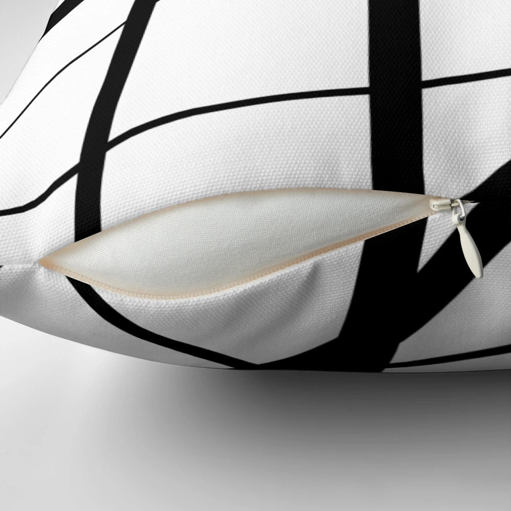 Black and white geometric lines accent pillow with a minimalist, Scandinavian-inspired design
