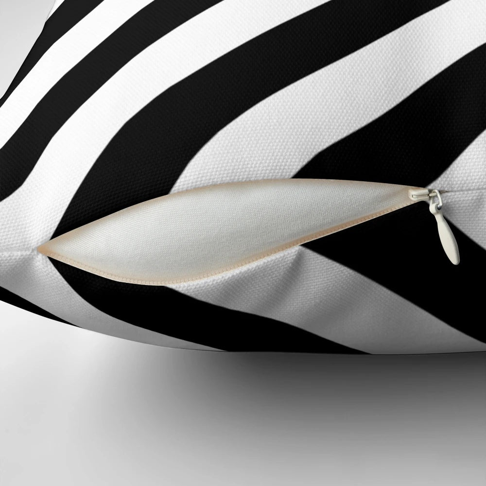 Decorative black and white geometric patterned throw pillow for modern home decor