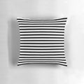 Black and white striped decorative pillow with modern, minimalist design