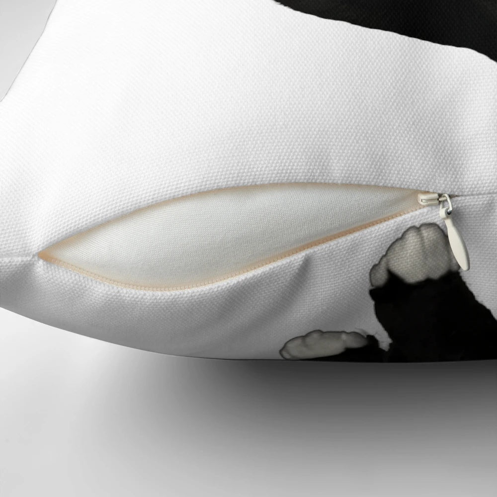 Plush black and white tuxedo cat pillow for cozy home decor