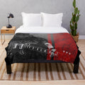 Black plush blanket with music theme