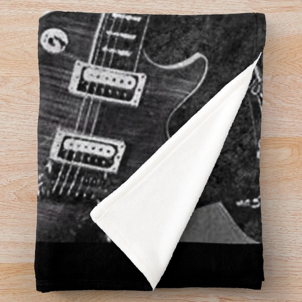 Black plush blanket with music theme