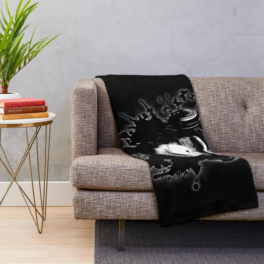 Black plush blanket with abstract monkey graffiti design