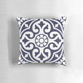 Blue and white patterned pillow with Moroccan-inspired trellis design