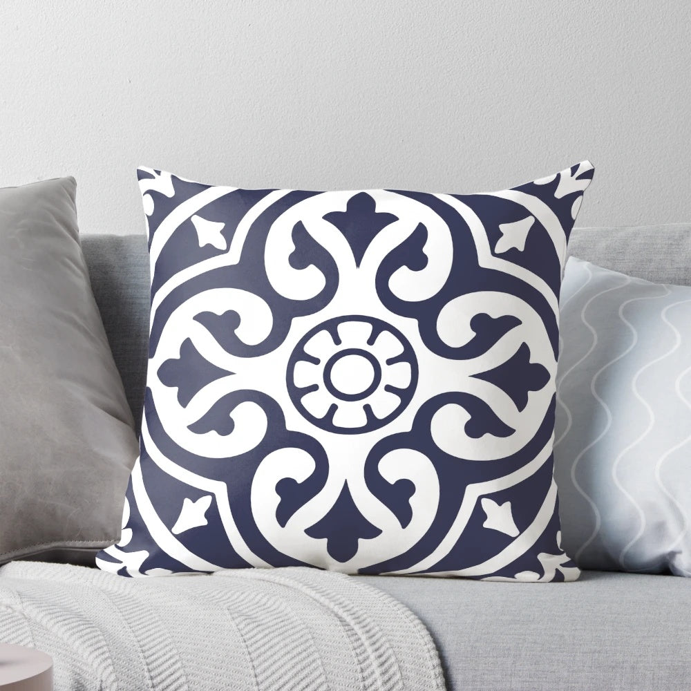 Blue and white patterned pillow with Moroccan-inspired trellis design