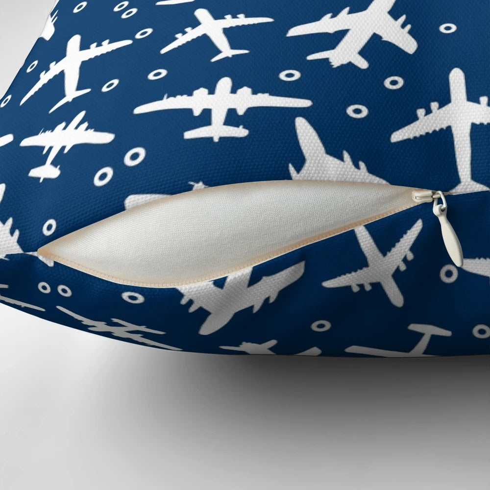 Blue and white decorative pillow with a silhouette pattern of aeroplanes