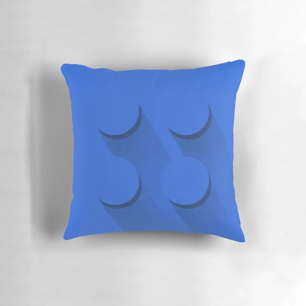 Blue brick-inspired pillow featuring a minimalist, cartoon-like design