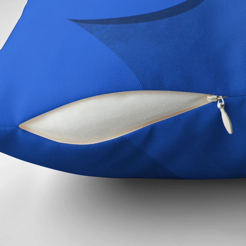 Blue brick-inspired pillow featuring a minimalist, cartoon-like design