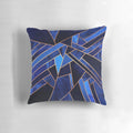 Blue geometric throw pillow with abstract mosaic pattern