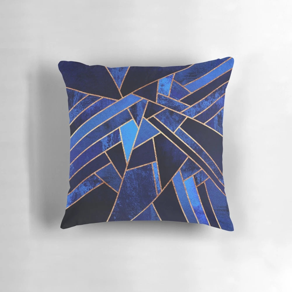 Blue geometric throw pillow with abstract mosaic pattern