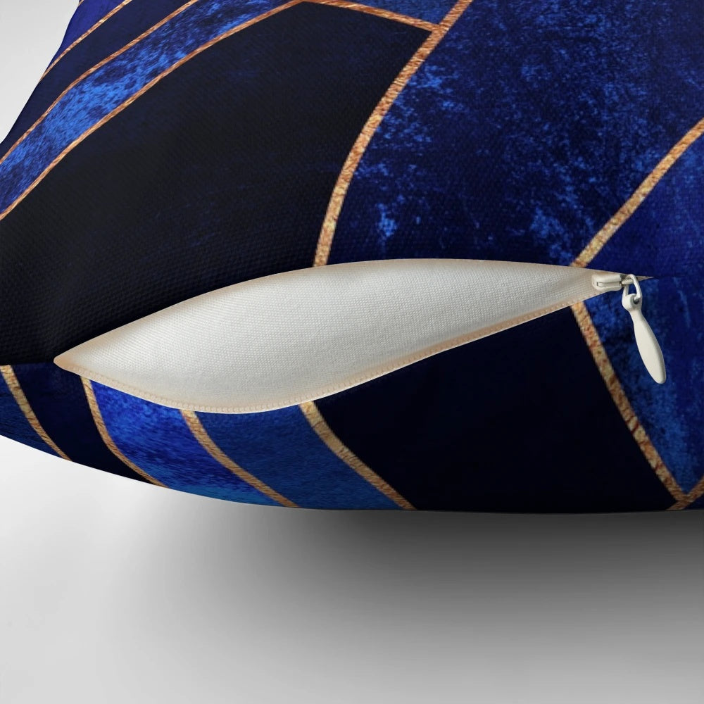 Blue geometric throw pillow with abstract mosaic pattern