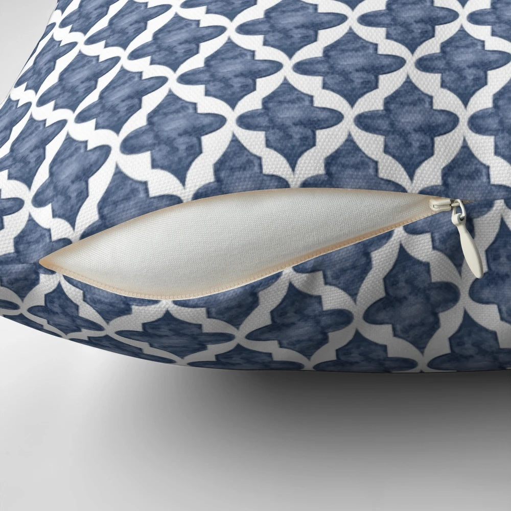 Blue patterned watercolor pillow with a unique shape, ideal for Hampton style home decor